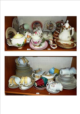 Lot 154 - Two shelves of part tea services including Royal Albert etc