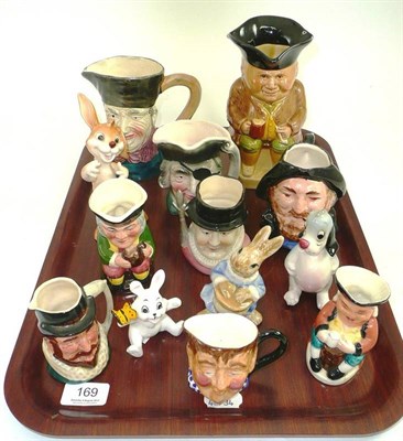 Lot 169 - Nine Toby jugs and four ceramic Disney figures