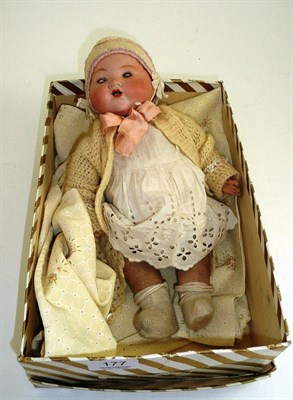 Lot 177 - Armand Marseille bisque head baby doll, impressed 351, on a fabric body with composition hands