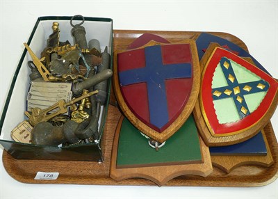 Lot 178 - Pewter icing syringes, lion mark caddy mounts, six oak heraldic shields, etc