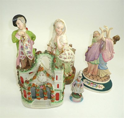 Lot 183 - A pair of late 19th/early 20th century French porcelain figures, Staffordshire etc