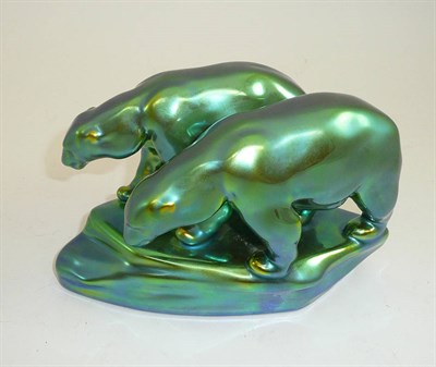 Lot 188 - A Zsolnay Pecs green lustre group of polar bears