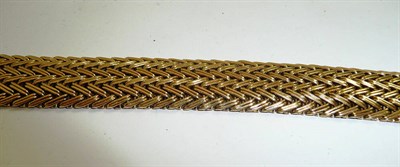 Lot 208 - A fancy link bracelet stamped '18k'