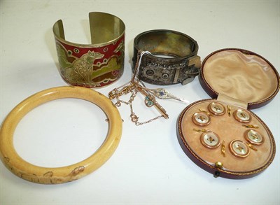 Lot 216 - A Victorian silver buckle bangle, an ivory bangle, three bar brooches, dress studs (cased) etc