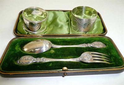 Lot 227 - Cased silver spoon and fork and two silver napkin rings