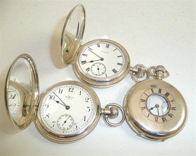 Lot 238 - Two silver full hunting cased keyless pocket watches and a silver half hunter keyless pocket...