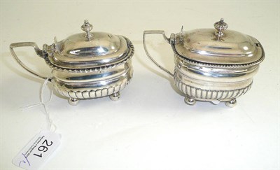 Lot 261 - Two silver salts with later blue plastic liners