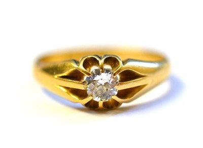 Lot 294 - An 18 Carat Gold Diamond Solitaire Ring, the old cut diamond in a claw setting, to a plain polished