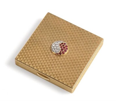 Lot 296 - A Ruby and Diamond Compact, by Cartier, the square form engine turned, with a double swirl to...