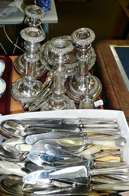 Lot 333 - A quantity of assorted plated ware including flatware, set of four candlesticks, bottle...