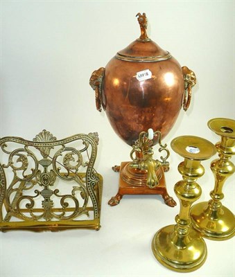 Lot 338 - Copper and brass samovar, brass easel, and a pair of brass candlesticks