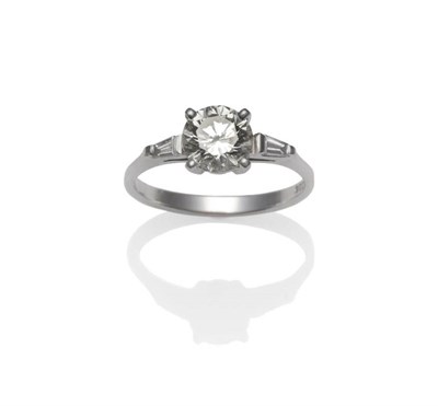 Lot 297 - An 18 Carat White Gold Diamond Solitaire Ring, the round brilliant cut diamond in a four claw...