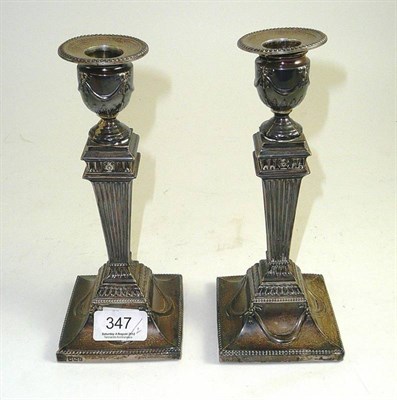 Lot 347 - Pair of silver Adam's style candlesticks (a.f.)