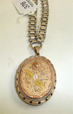 Lot 376 - A silver locket on Victorian chain