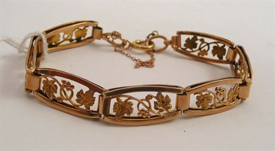 Lot 377 - A 9ct gold floral-decorated bracelet