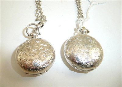 Lot 380 - Two silver sovereign cases and a chain