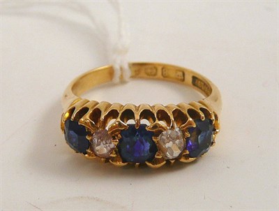 Lot 393 - A 18ct gold sapphire and diamond five stone ring