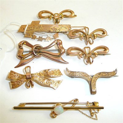 Lot 396 - Assorted brooches and an opal bar brooch stamped '15'