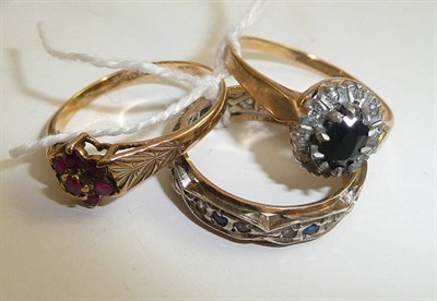 Lot 408 - An eternity ring, a ruby ring and a diamond ring (3)