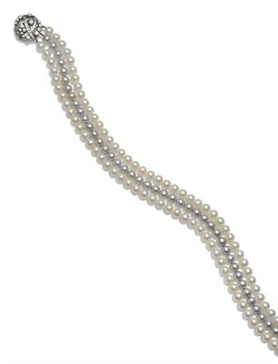 Lot 304 - A Cultured Pearl Necklace, the three rows of cultured pearls include one row of fifty-five...