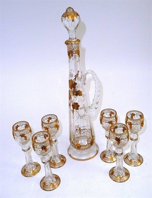 Lot 428 - Glass and gold decorated liquor set