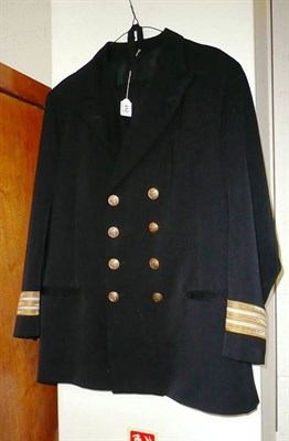 Lot 442 - A British Merchant Navy Uniform, post Second World War, comprising jacket with brass buttons...