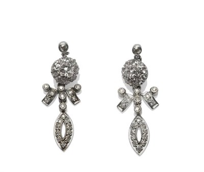 Lot 308 - A Pair of Diamond Cluster Earrings, a collet set old cut diamond suspends a cluster of old cut...