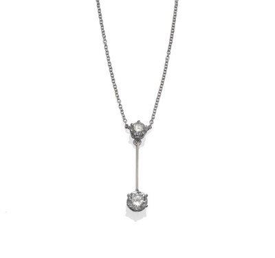 Lot 311 - A Diamond Drop Necklace, a pendant drop comprising a round brilliant cut diamond suspending a knife