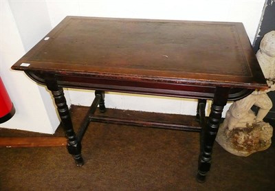 Lot 514 - Walnut writing table