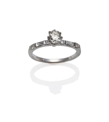 Lot 315 - An 18 Carat White Gold Diamond Solitaire Ring, an old cut diamond in a claw setting sits above...