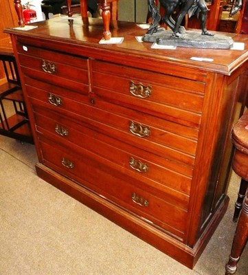 Lot 538 - Edwardian walnut five drawer chest and a 1920's double foot stool