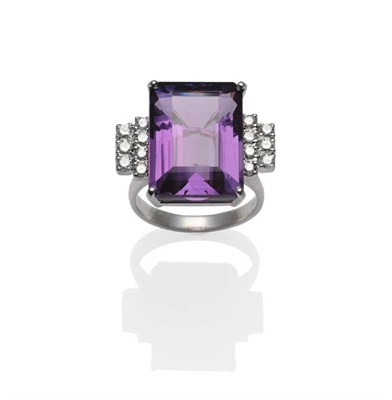 Lot 316 - An 18 Carat White Gold Amethyst and Diamond Ring, the baguette cut amethyst flanked by two rows...