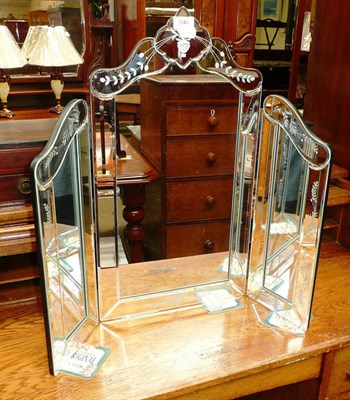 Lot 546 - A reproduction Venetian style mirror