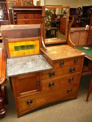 Lot 558 - An Arts & Crafts dressing chest with marble top and tiled back