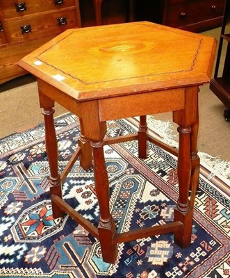 Lot 564 - Inlaid oak pub table