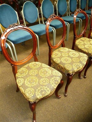 Lot 574 - A set of four Victorian balloon back chairs with cabriole legs