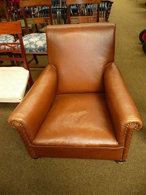 Lot 580 - A Brown leather 1920's armchair