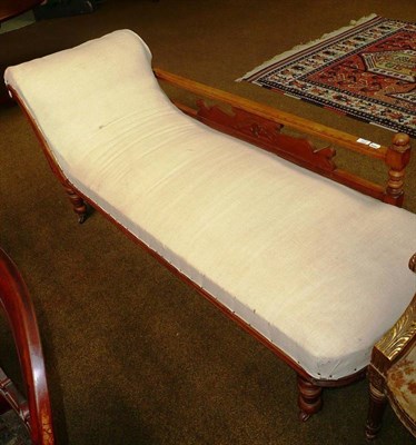 Lot 592 - Late 19th/early 20th century carved walnut chaise longue