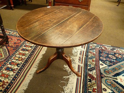 Lot 596 - Oak tripod table