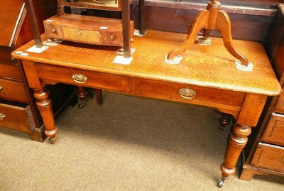 Lot 600 - A Victorian oak two drawer side table