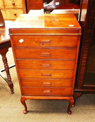 Lot 615 - A walnut sheet music cabinet