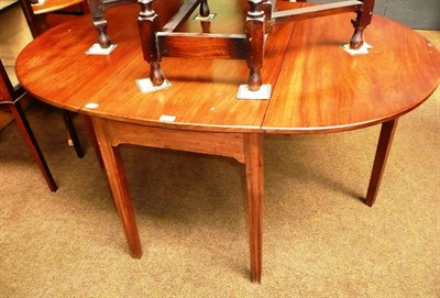 Lot 616 - George III mahogany dining table (repairs)