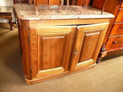 Lot 620 - French oak two door cupboard with marble top (a.f.)