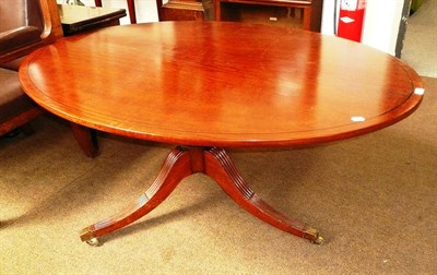 Lot 638 - Regency style oval mahogany breakfast table