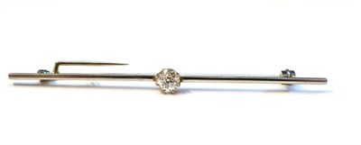 Lot 326 - A Diamond Bar Brooch, an old cut diamond in a white eight claw setting centres a plain bar,...