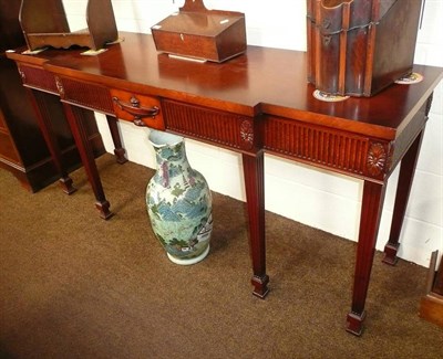 Lot 647 - A Titchmarsh & Goodwin Adams style serving table