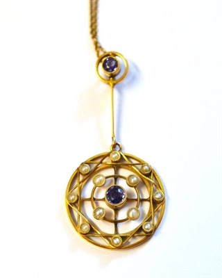 Lot 328 - A Sapphire and Seed Pearl Pendant on Chain, the early 20th century pendant set with two...