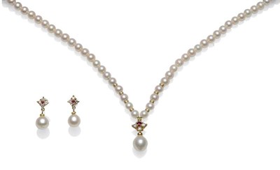 Lot 329 - A Cultured Pearl, Diamond and Ruby Necklace, the uniform cultured pearls with roundel spacers...