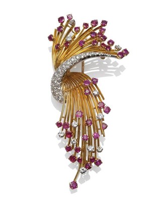 Lot 333 - An 18 Carat Gold Diamond and Ruby Brooch, by Kutchinsky, of spray form, set with mixed cut...