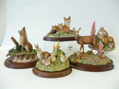 Lot 1029 - Border Fine Arts, Roe Doe with fawns 'In A Sunny Glade', model No. BO255, 15cm high; Hare 'The...